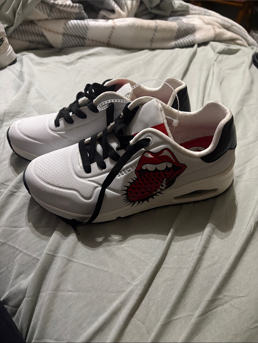 Skechers White Sneakers with Red Graphic and Black Accents